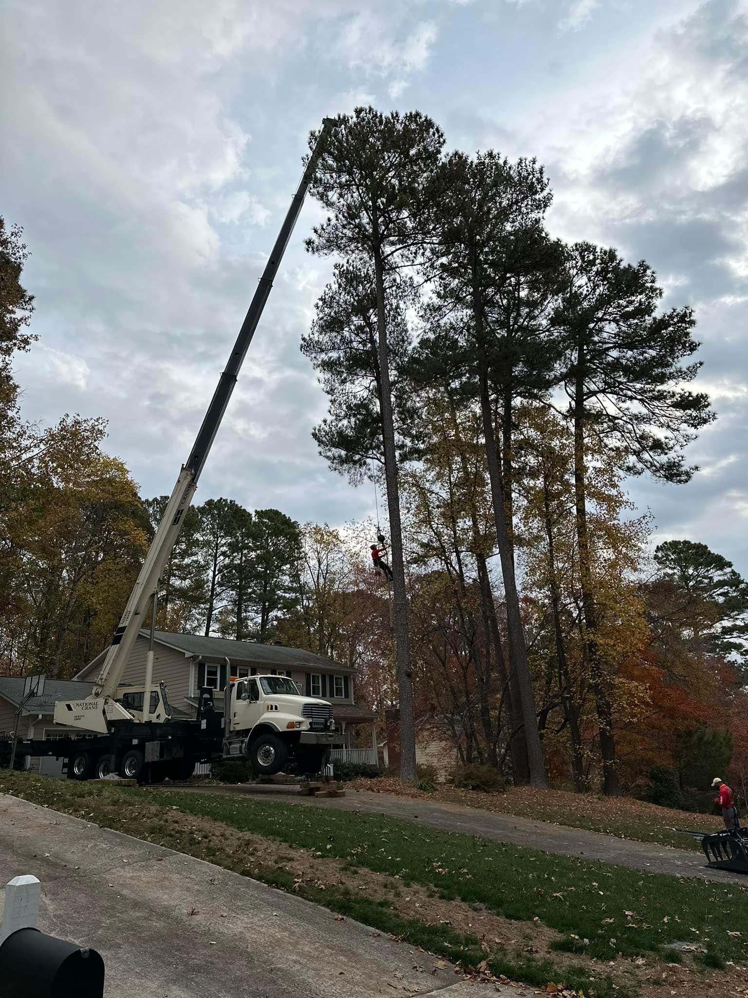 Crane set up on a sloped residential access